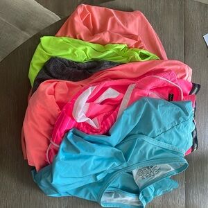 Bundle of women’s large triathlon tank tops and shirt